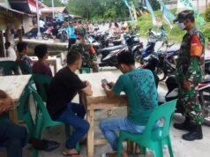 Babinsa Koramil 10/Lolowau, Laksanakan Kegiatan Komunikasi Sosial Tentang Protokol Kesehatan di Desa Lolowau