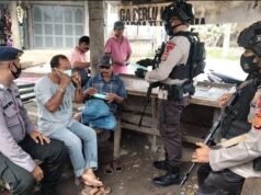 Patroli Sambang Desa, Brimob Polda Aceh Bagikan Masker dan Himbau Masyarakat Untuk Vaksin