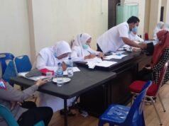 Tim Vaksinasi Puskesmas Kandang, Lakukan Vaksinasi di Aula Mapolres Lhokseumawe