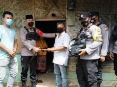 Kapolres Lhokseumawe Kunjungi dan Serahkan Bantuan “Kue Surga” Pada Warga Miskin di Paya Bili Meurah Mulia