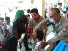 Babinsa 10 Lolowau Kodim 0213/Nias, Menghadiri Pelaksanaan Serbuan Vaksin Covid-19 di SDN 078549 Botohili