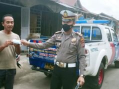 Tak Kenal Lelah, Sat Lantas Polres Tanjungbalai Terus Bagikan Masker Gratis kepada Warga
