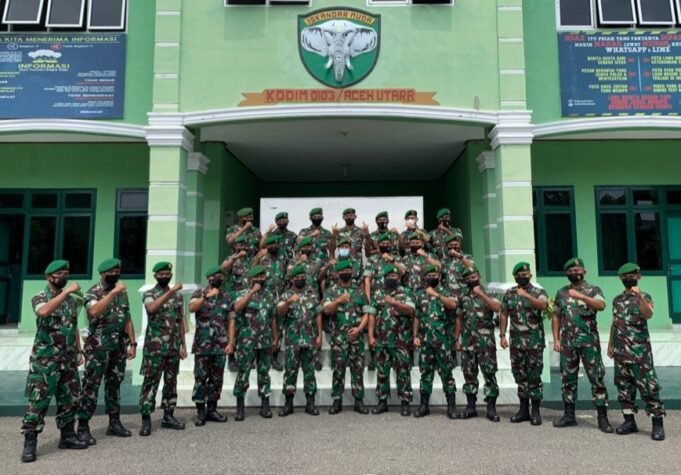Kodim 0103/Aut Gelar Upacara Korps Raport Pindah Satuan dan Penerimaan Warga Baru
