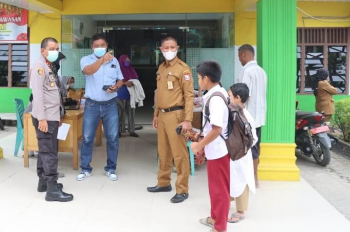 Kapolres Tanjungbalai Tinjau Penyaluran BLT dan Vaksinasi Bagi Masyarakat Kota Tanjungbalai