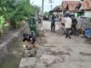 Satgas TMMD dan Warga Lanjutkan Pembangunan TPT di Desa Longok