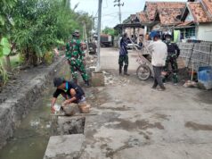 Satgas TMMD dan Warga Lanjutkan Pembangunan TPT di Desa Longok